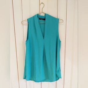 Sleeveless Turquoise Blouse